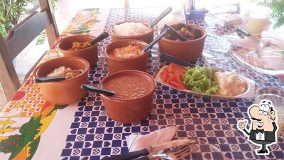 Sente em uma das mesas no Restaurante WF
