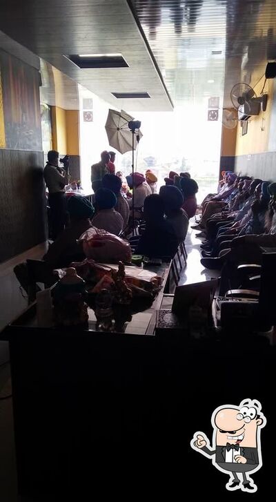 Take a seat at one of the tables at Gravie TOSSE Restro Bar