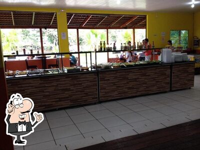 Sente em uma das mesas no Churrascaria Sabor do Sul III