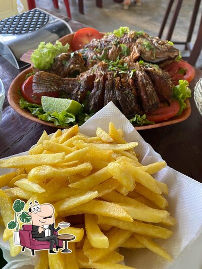Sente em uma das mesas no Restaurante Boteco da Gal