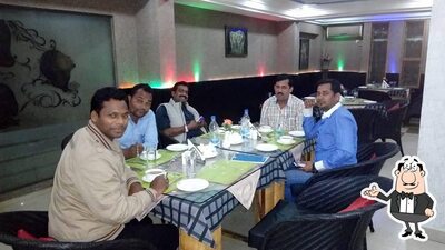 Take a seat at one of the tables at Radhika Restaurant