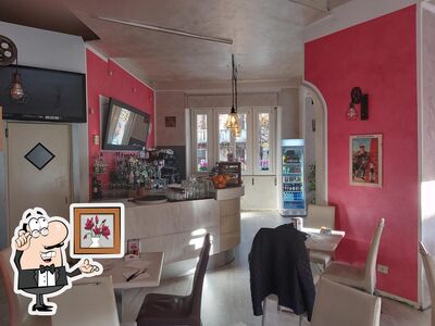 Dai un'occhiata agli interni di D.D Cafe’