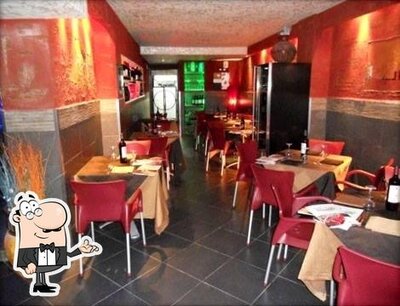 Dai un'occhiata agli interni di Pooranam Risto Pub Palermo