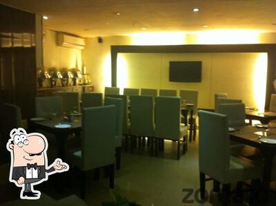 Take a seat at one of the tables at Royal Cafe