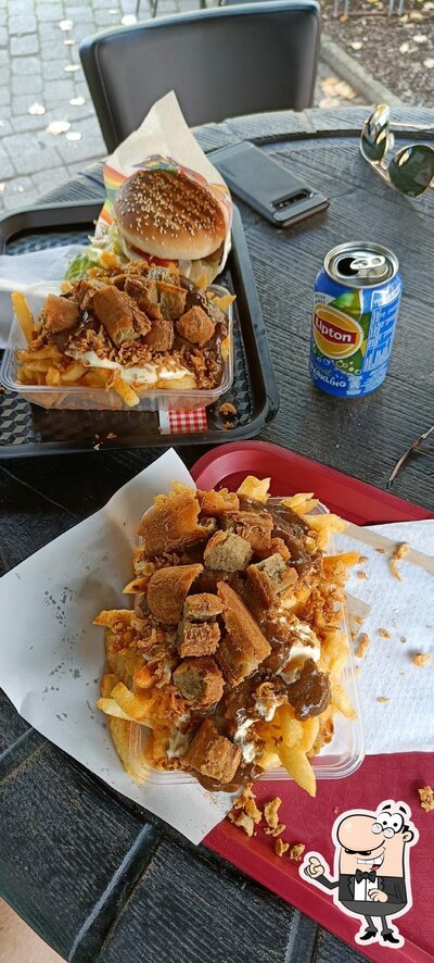 Installez-vous à l'une des tables de Friet-jess