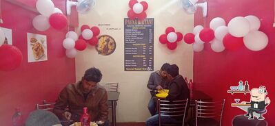 Take a seat at one of the tables at PATNA BIRYANI