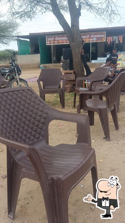 Take a seat at one of the tables at Maharaja Restorent