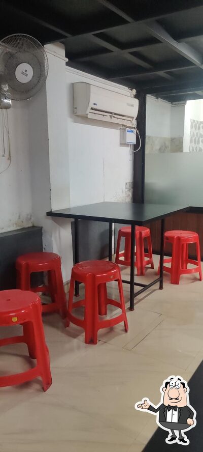 Take a seat at one of the tables at Karotie Mess