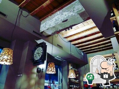 Puoi goderti l'aria fresca da seduto all'esterno di Il Quarto di Via Ravizza