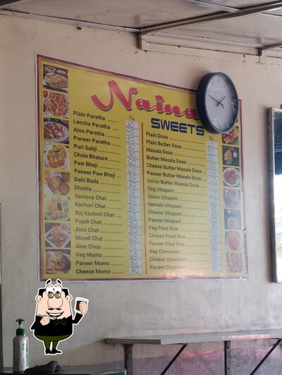 Enjoy a beverage at NAINA SWEETS
