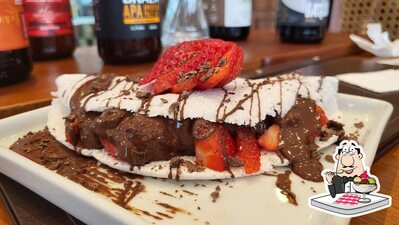 LUGANO - Cafeteria e Chocolataria provê uma seleção de pratos doces