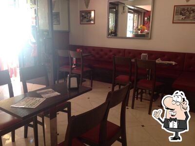 Dai un'occhiata agli interni di Gran Caffè Roma