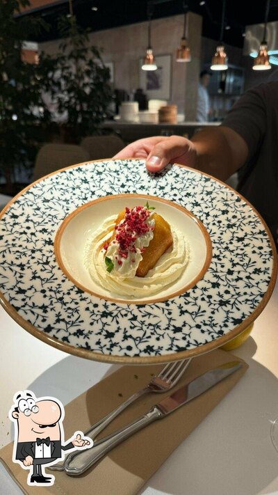 Installez-vous à l'une des tables de Trattoria