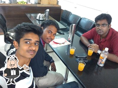 Take a seat at one of the tables at Fire & Ice Family Restaurant Restaurant in Ujjain