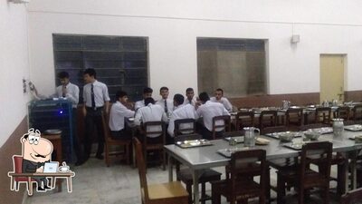 Take a seat at one of the tables at Cadet's Mess
