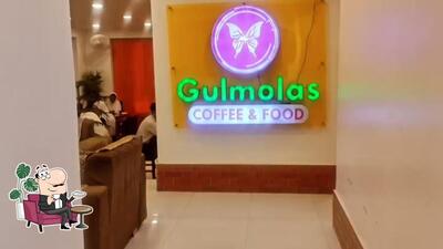 Take a seat at one of the tables at Gulmolas