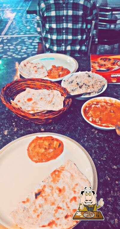 Try out pizza at Bhavani Grand