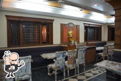 Take a seat at one of the tables at Golden Dum Biryani House