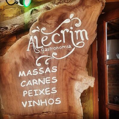A publicidade apresenta informações sobre o Restaurante Alecrim