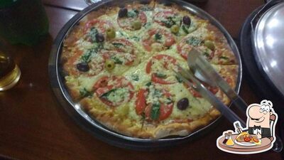 No Pizzaria R. Tosim Mairiporã SP, você pode degustar pizza