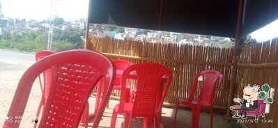 Take a seat at one of the tables at Thappa Cafeteria