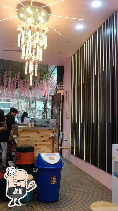 Take a seat at one of the tables at Amrutulya ketli chai