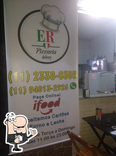 A publicidade mostra informações sobre o E.R. Pizzaria e Pastelaria