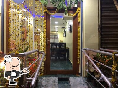 Check out how Neem Tree Restaurant Puttaparthi looks inside