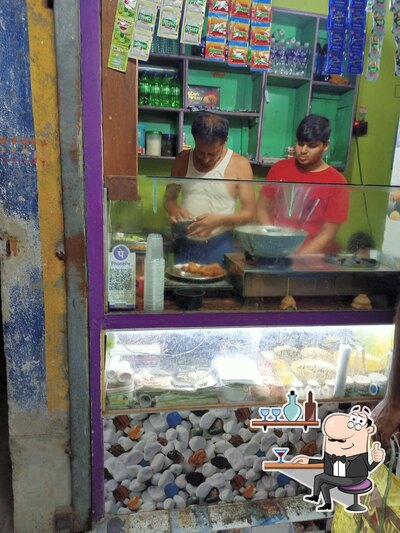 Take a seat at one of the tables at Bhakta Tea Stall