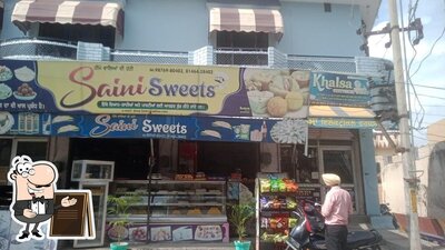 You can get some fresh air outside Saini sweet shop
