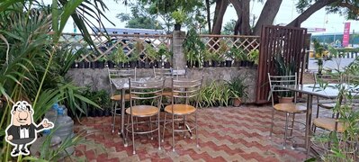 Take a seat at one of the tables at Mungil cafe