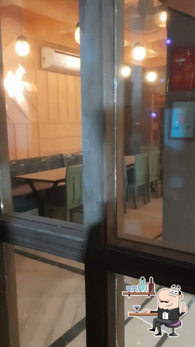 The interior of Girnar Rooftop Restra ( Restaurant )