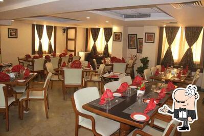 Check out how Navratna - Hotel Green Acres looks inside