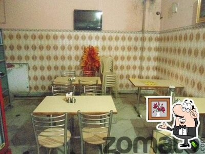 Take a seat at one of the tables at Food Castle