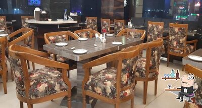 Take a seat at one of the tables at Fire&ice Cafe N Lounge