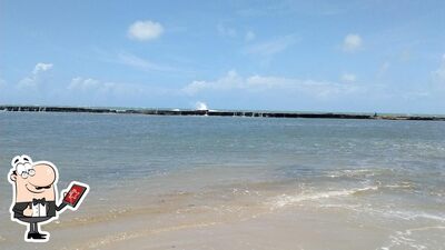 Você pode espairecer no na área externa do Barraca do Caranguejo