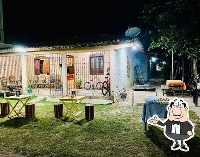 Sente em uma das mesas no DELAS' SPETUS