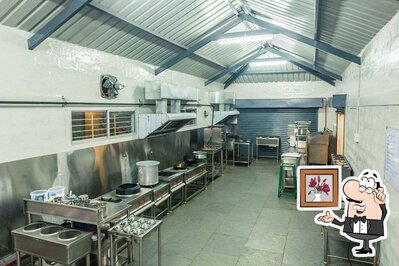 Take a seat at one of the tables at Annapoorna Aahar