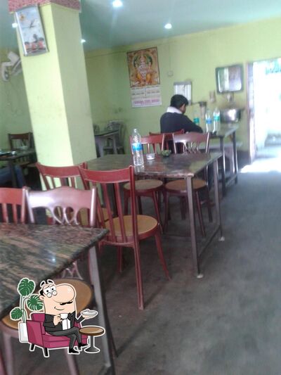 Take a seat at one of the tables at Family Restaurant