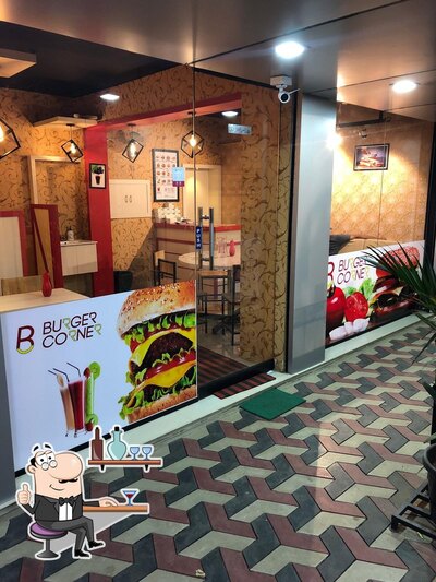 Take a seat at one of the tables at Burger corner