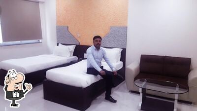 Take a seat at one of the tables at HOTEL SAVERA