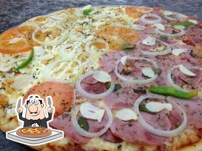 No Restaurante e Petiscaria Paradise, você pode degustar pizza