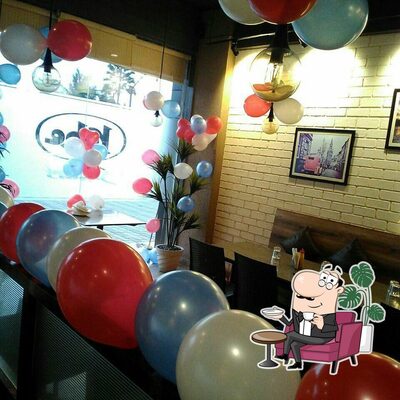 Take a seat at one of the tables at KobeSizzlers Silvassa