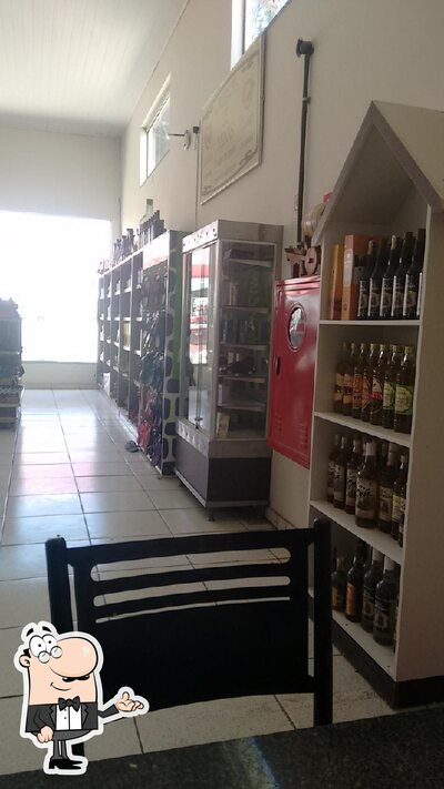 Sente em uma das mesas no Churrascaria Boi de Minas