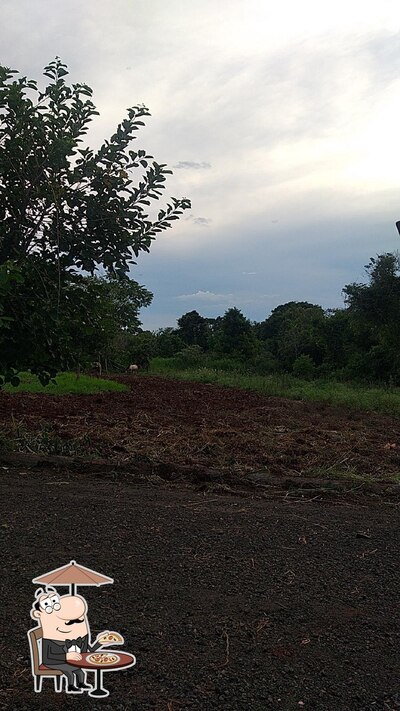 Desfrute da vista da área externa do Chacara Racanto Dos Ipes