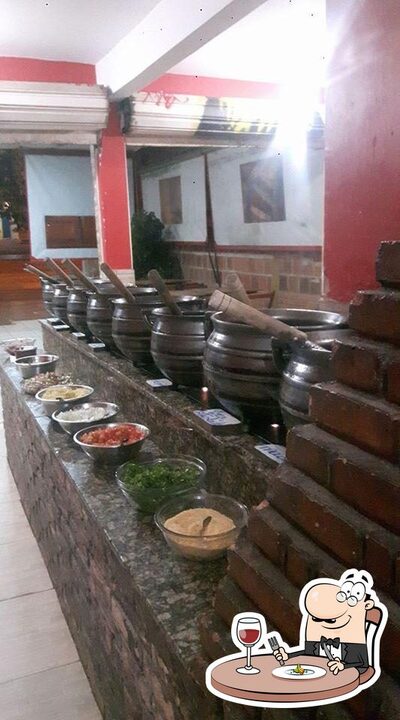Comida em Vaca Atolada