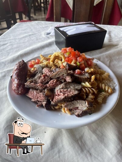 Sente em uma das mesas no Restaurante Ponto Alto