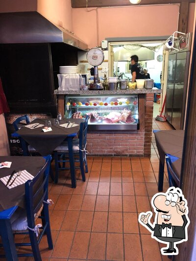 Take a seat at one of the tables at Steak House