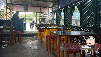 Take a seat at one of the tables at SONA HOTEL