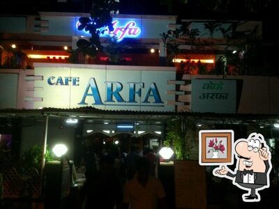 Take a seat at one of the tables at Arfa hotel